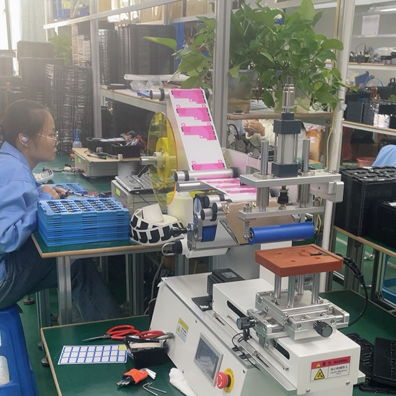 Adhesive sticking machine